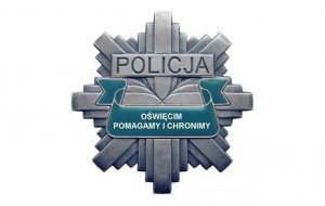 Gwiazda policyjna logo oświęcimskiej Policji z napisem pomagamy i chronimy