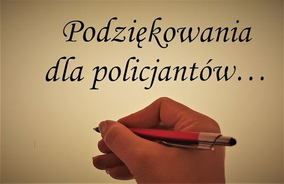 Napis podziękowania dla policjantów ręka trzymająca długopis